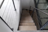 escalier-quart-tournant-limon-extérieur-marche-en-pierre-dans-caisson-acier-1